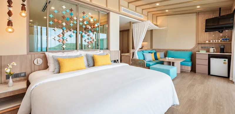 Open-plan bedroom and lounge inside the Sky Pool Villa